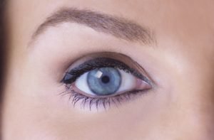 A woman with clear vision looking forward